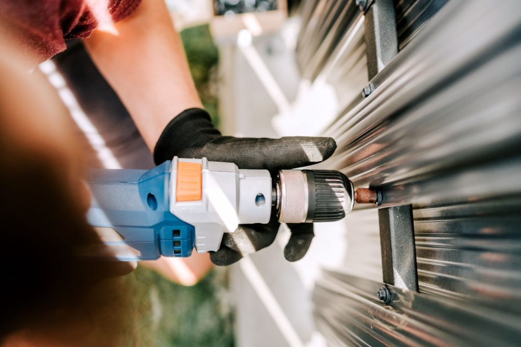handyman worker using electrical cord screwdriver 2026 03 09 03 27 03 utc1 Siding Installation in Stanwood, WA | Contractors