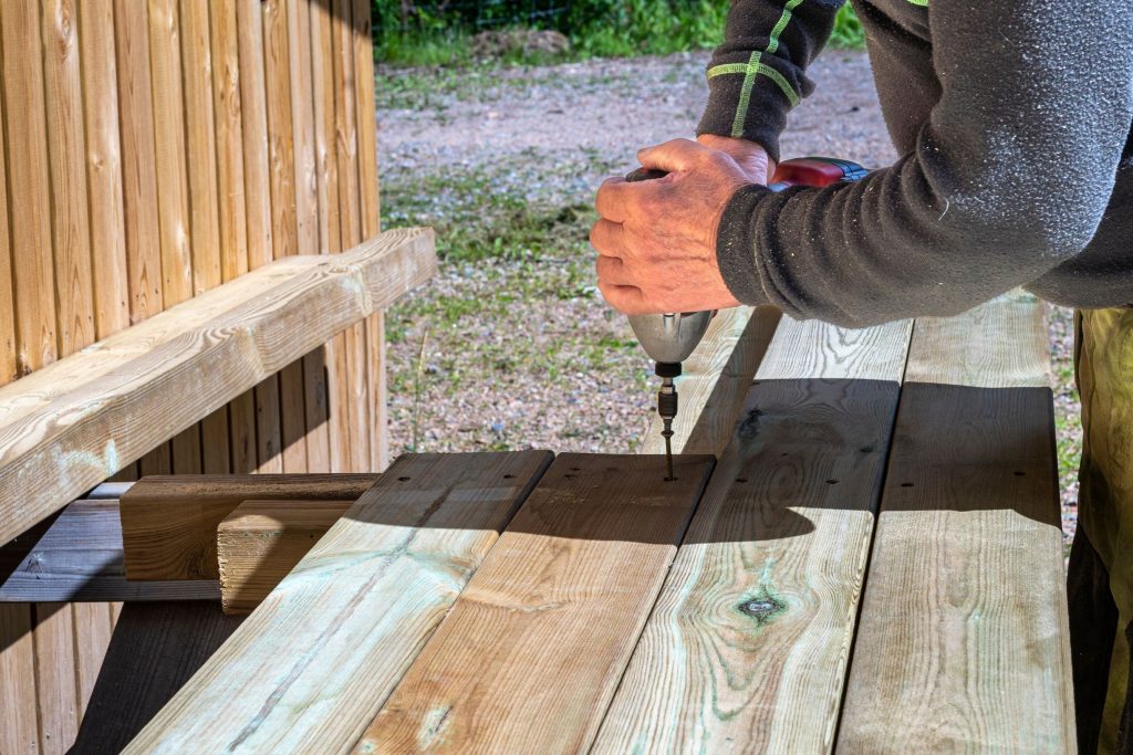 the work of a carpenter men s hard working hands 2026 03 09 23 09 54 utc1 Deck Building Services in Stanwood, WA | Builders