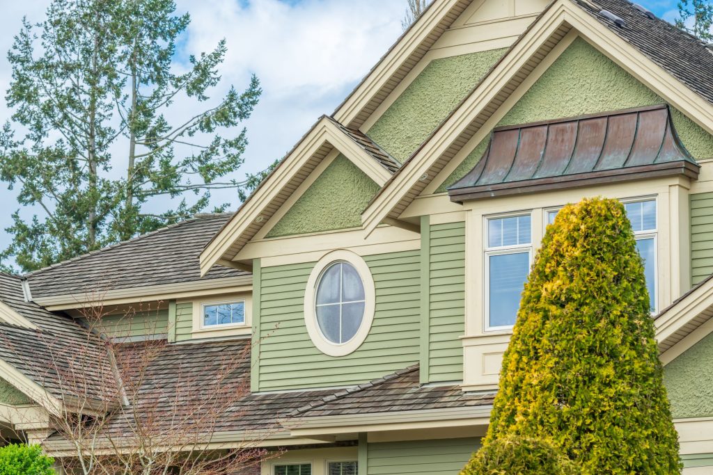 the top of the house or apartment building with ni 2026 03 26 10 49 44 utc1 Siding Services in Stanwood, WA | Installation Experts